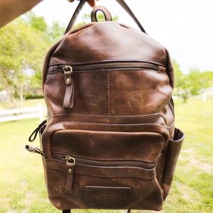 Brown rugged leather Rawlings backpack